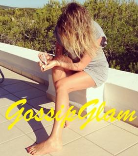 Alessia Marcuzzi feet photo thumbnail