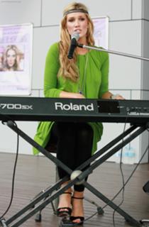 Delta Goodrem feet photo thumbnail