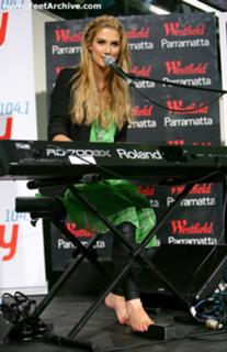 Delta Goodrem feet photo thumbnail