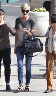 Charlize Theron feet photo thumbnail