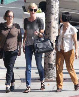 Charlize Theron feet photo thumbnail