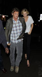 Charlize Theron feet photo thumbnail