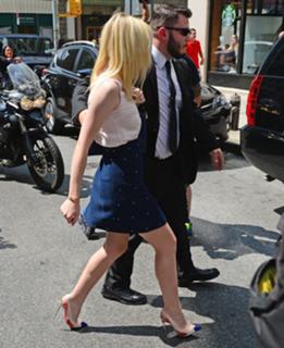 Dakota Fanning feet photo thumbnail