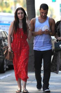 Lily Collins feet photo thumbnail