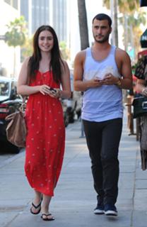 Lily Collins feet photo thumbnail