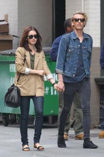 Lily Collins feet photo thumbnail