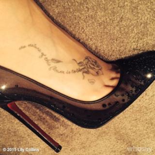 Lily Collins feet photo thumbnail