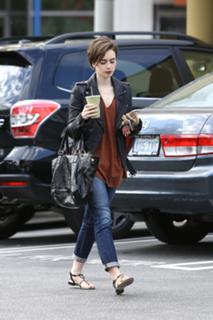 Lily Collins feet photo thumbnail