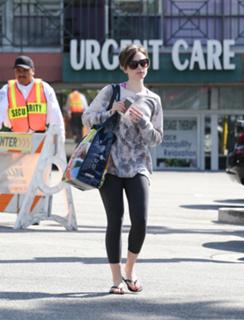Lily Collins feet photo thumbnail