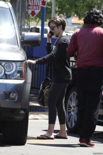 Lily Collins feet photo thumbnail