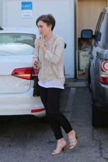 Lily Collins feet photo thumbnail