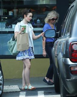 Lily Collins feet photo thumbnail