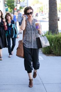 Lily Collins feet photo thumbnail