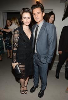 Lily Collins feet photo thumbnail