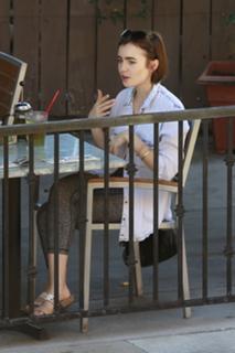 Lily Collins feet photo thumbnail