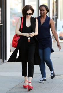 Lily Collins feet photo thumbnail