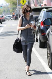 Lily Collins feet photo thumbnail