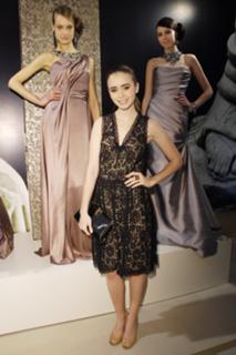 Lily Collins feet photo thumbnail