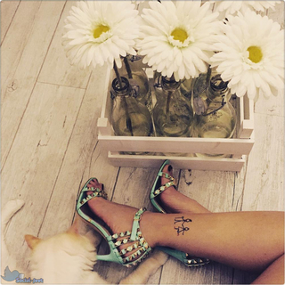 Melita Toniolo feet photo thumbnail