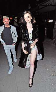 Lily Collins feet photo thumbnail