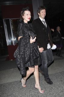 Milla Jovovich feet photo thumbnail