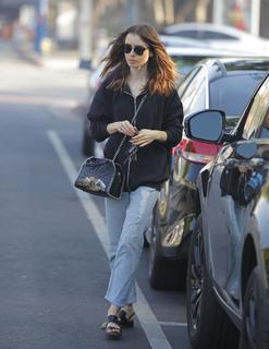 Lily Collins feet photo thumbnail