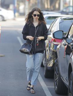 Lily Collins feet photo thumbnail