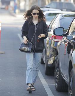 Lily Collins feet photo thumbnail