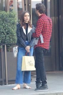 Lily Collins feet photo thumbnail