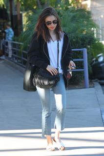 Lily Collins feet photo thumbnail