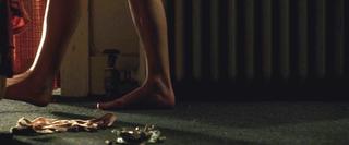 Milla Jovovich feet photo thumbnail