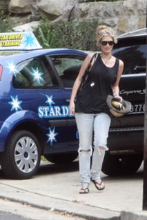 Delta Goodrem feet photo thumbnail