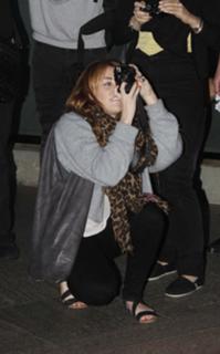 Miley Cyrus feet photo thumbnail