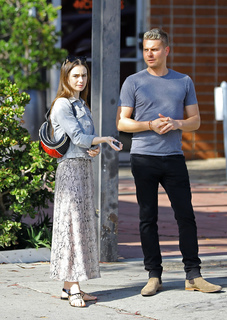 Lily Collins feet photo thumbnail