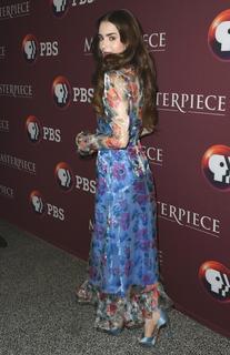 Lily Collins feet photo thumbnail