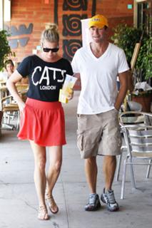 Rebecca Romijn feet photo thumbnail