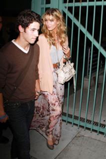 Delta Goodrem feet photo thumbnail