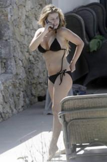 Carmen Electra feet photo thumbnail
