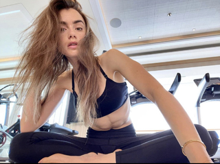 Lily Collins feet photo thumbnail