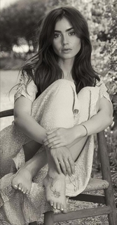 Lily Collins feet photo thumbnail