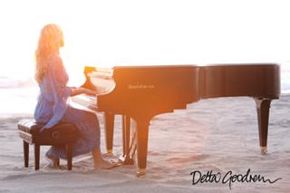 Delta Goodrem feet photo thumbnail