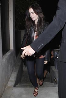 Lily Collins feet photo thumbnail