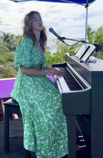 Delta Goodrem feet photo thumbnail