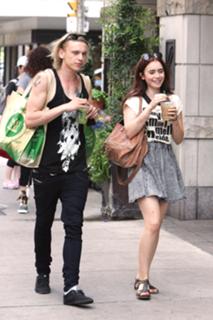 Lily Collins feet photo thumbnail