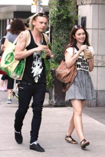 Lily Collins feet photo thumbnail