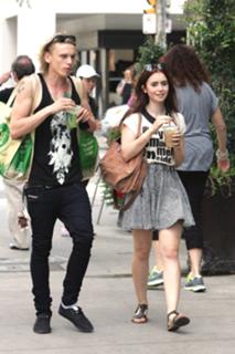 Lily Collins feet photo thumbnail