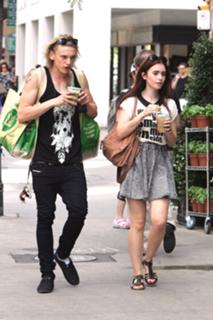 Lily Collins feet photo thumbnail