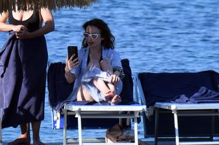 Lily Collins feet photo thumbnail