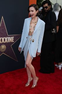 Lily Collins feet photo thumbnail