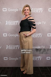 Rebecca Romijn feet photo 1